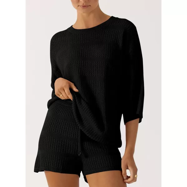 imagePRETTYGARDEN Womens Two Piece Outfits Summer Hollow Out Knit Lounge Sets Half Sleeve Tops Blouses and Shorts TracksuitBlack