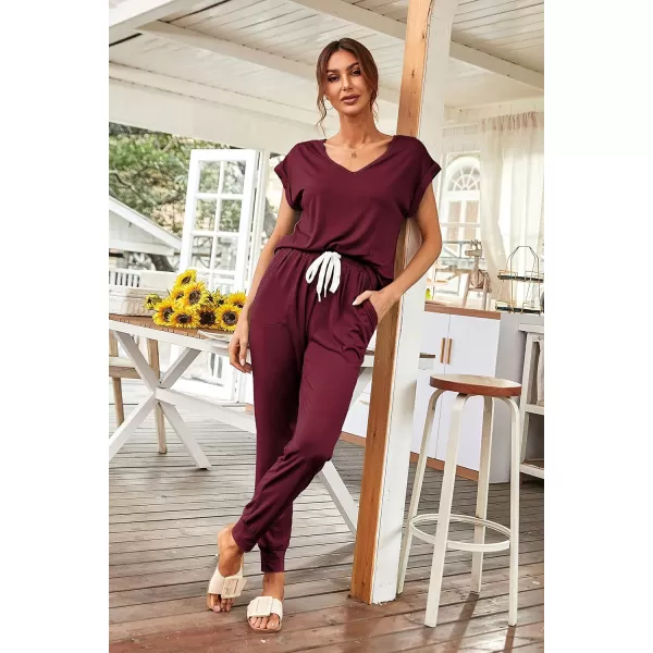 imagePRETTYGARDEN Womens Two Piece Tracksuit V Neck Short Sleeve Tops Long Pants With Drawstring Outfits Jogger SetsJujube Red
