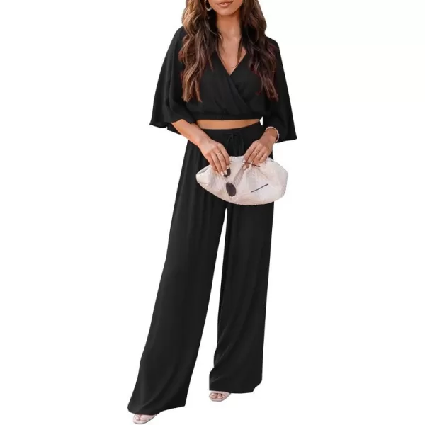 imagePRETTYGARDEN 2 Piece Outfits for Women 2023 Summer Short Sleeve Wrap V Neck Crop Tops Wide Leg Pants SetBlack