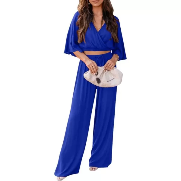 imagePRETTYGARDEN 2 Piece Outfits for Women 2023 Summer Short Sleeve Wrap V Neck Crop Tops Wide Leg Pants SetRoyal Blue