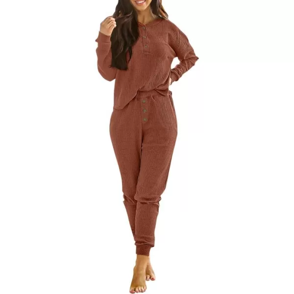 imagePRETTYGARDEN Womens 2 Piece Waffle Knit Lounge Outfit Long Sleeve Henley Top and Sweatpants Set TracksuitRust Red