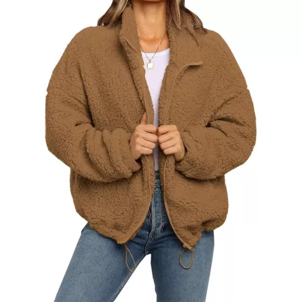 imagePRETTYGARDEN Womens 2023 Fashion Winter Coat Long Sleeve Lapel Zip Up Faux Shearling Shaggy Oversized Shacket JacketStyle One Camel