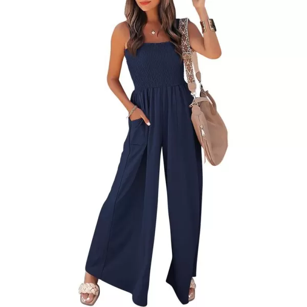 imagePRETTYGARDEN Womens Summer Jumpsuits Dressy Casual One Piece Outfits Linen Smocked Spaghetti Strap Pockets Wide Leg RompersNavy