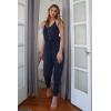 imagePRETTYGARDEN Womens Summer Casual One Piece Jumpsuits Spaghetti Strap Pants Romper 2025 Spring Vacation Resort OutfitsSolid Navy