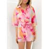 imagePRETTYGARDEN Womens Rompers for Summer 2025 Beach Vacation Clothes Short Sleeves Floral Jumpsuits Beach Cover UpPink