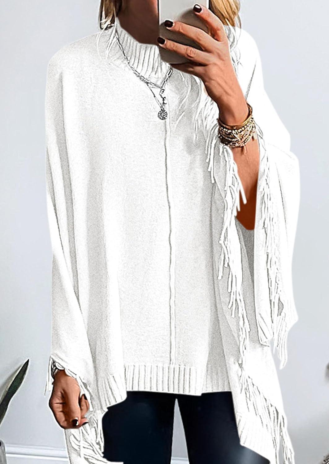 imagePRETTYGARDEN Womens 2025 Fall Winter Poncho Sweaters Trendy Chunky Knit Fringe Shawls Wraps Pullover Tops Holiday OutfitsWhite